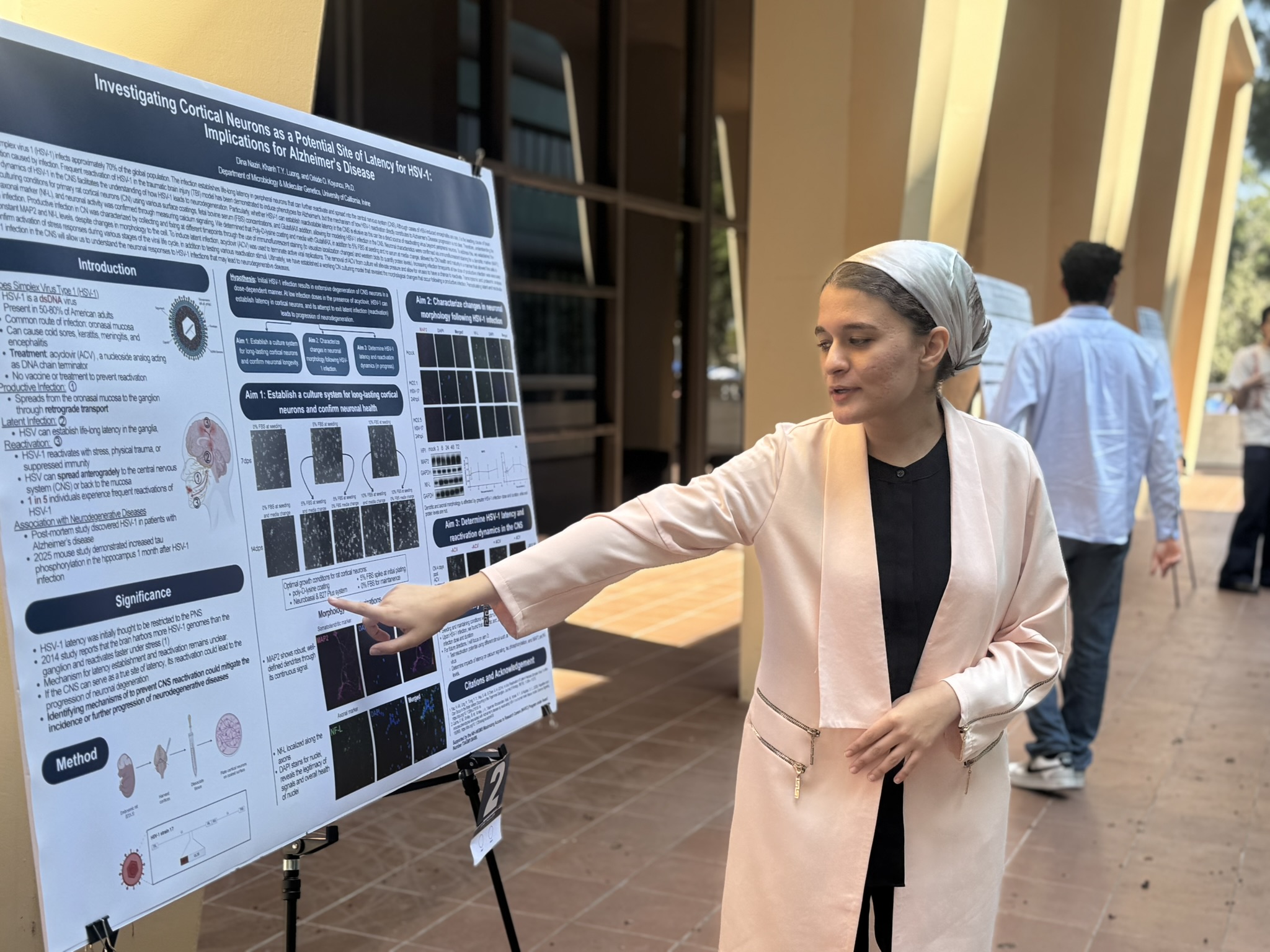 Scholar presenting her poster